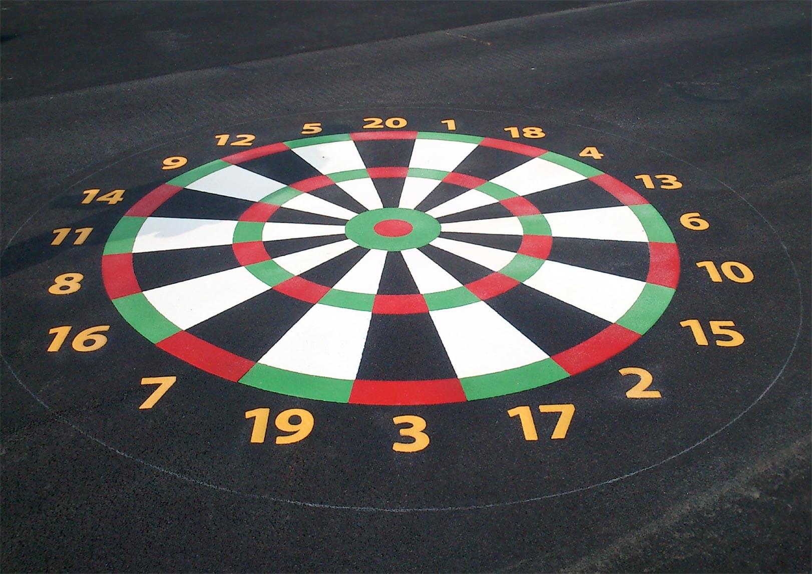 Dartboard marking at Reevy Hill Primary School with red and green rings, black and white segments and yellow numbers