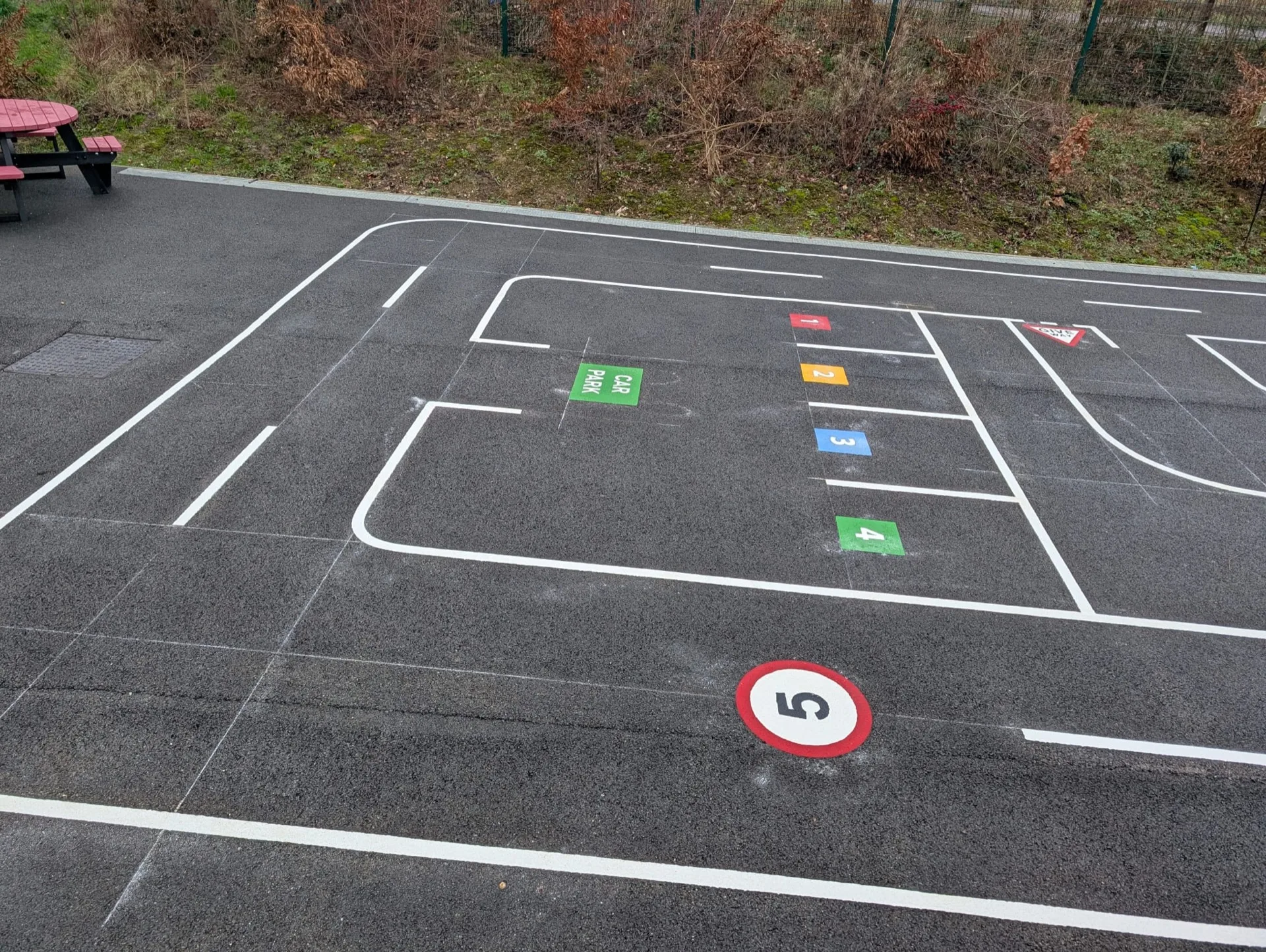 Real roadway markings installed on a school playground